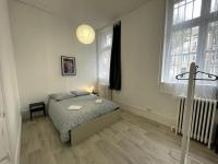Posteľ alebo postele v izbe v ubytovaní Agréable maison de ville dans la plus belle Avenue