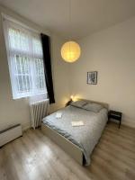 Posteľ alebo postele v izbe v ubytovaní Agréable maison de ville dans la plus belle Avenue