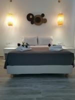 Postel nebo postele na pokoji v ubytování Galazio Rooms & Suites