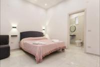 A bed or beds in a room at Alessandra’s house
