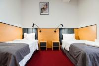 Hotel Poniatowskiにあるベッド