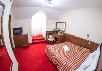 Hotel Poniatowskiにあるベッド