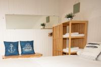 Łóżko lub łóżka w pokoju w obiekcie LA MARINA amplio apartamento en pleno centro de Hondarribia
