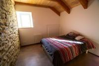 Posteľ alebo postele v izbe v ubytovaní Appartement charmant à Saint-Côme-d'Olt - 80 m² avec balconc