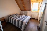 Posteľ alebo postele v izbe v ubytovaní Appartement charmant à Saint-Côme-d'Olt - 80 m² avec balconc