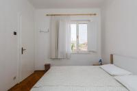 Posteľ alebo postele v izbe v ubytovaní Apartments Jelen