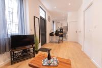 Telewizja i/lub zestaw kina domowego w obiekcie KASA LOFT CENTRE 2 - WIFI et TV - Confortable et stationnement gratuit à proximité