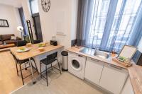 Kuchnia lub aneks kuchenny w obiekcie KASA LOFT CENTRE 2 - WIFI et TV - Confortable et stationnement gratuit à proximité