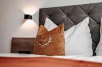 Posteľ alebo postele v izbe v ubytovaní Tanners Chalet Apartments