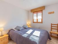 Łóżko lub łóżka w pokoju w obiekcie Appartement cosy à Flumet, 3 chambres, balcon sud, Wi-Fi, parking, près des pistes et navettes gratuites - FR-1-595-61