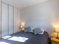 Łóżko lub łóżka w pokoju w obiekcie Appartement cosy à Flumet, 3 chambres, balcon sud, Wi-Fi, parking, près des pistes et navettes gratuites - FR-1-595-61