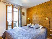 Łóżko lub łóżka w pokoju w obiekcie Appartement cosy à Flumet, 3 chambres, balcon sud, Wi-Fi, parking, près des pistes et navettes gratuites - FR-1-595-61