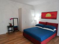 A bed or beds in a room at Royal Appartament