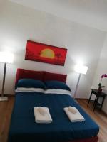 A bed or beds in a room at Royal Appartament