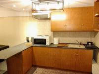 Kuchyňa alebo kuchynka v ubytovaní Central Athens Pad