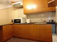 Kuchyňa alebo kuchynka v ubytovaní Central Athens Pad