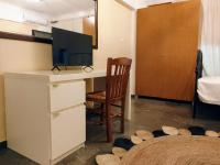 Kuchyňa alebo kuchynka v ubytovaní Central Athens Pad