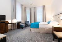 Postel nebo postele na pokoji v ubytování OREA Spa Hotel Bohemia Mariánské Lázně