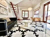 A seating area at SIXTIES SUN & SEA MONTEROSSO