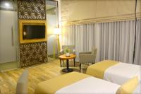 Belmont Boutique Hotel - Free Airport Shuttle Serviceにあるベッド