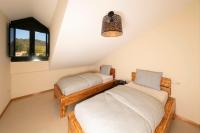 Posteľ alebo postele v izbe v ubytovaní Apartamento Lura de Fisterra Playa de Langosteira en Finisterre con vistas al mar
