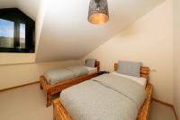 Posteľ alebo postele v izbe v ubytovaní Apartamento Lura de Fisterra Playa de Langosteira en Finisterre con vistas al mar