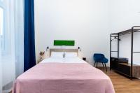 Posteľ alebo postele v izbe v ubytovaní Adagio Downtown Rooms