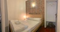 Postel nebo postele na pokoji v ubytování Studio Apartment - Tv da Madalena 05