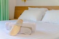 A bed or beds in a room at Residence al Palace