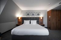 Posteľ alebo postele v izbe v ubytovaní Heron Live Hotel Marina & SPA