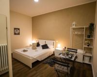 Postel nebo postele na pokoji v ubytování Essential Rooms