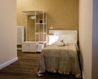 Postel nebo postele na pokoji v ubytování Essential Rooms