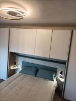 A bed or beds in a room at Vistalago