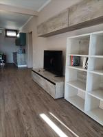 A television and/or entertainment centre at Vistalago