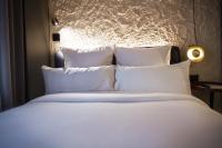 A bed or beds in a room at Letoh Letoh Gran Vía
