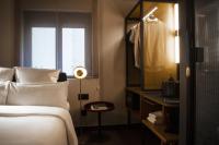 A bed or beds in a room at Letoh Letoh Gran Vía