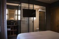 A bed or beds in a room at Letoh Letoh Gran Vía