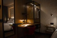 A bed or beds in a room at Letoh Letoh Gran Vía