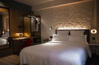 A bed or beds in a room at Letoh Letoh Gran Vía