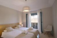 Postel nebo postele na pokoji v ubytování Sotogrande Alboaire- Waterfront luxury 4 bedroom Apt in the Marina of Sotogrande