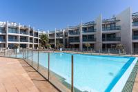 Bazén v ubytování Appartamento SOL Y PLAYA a El Cotillo. nebo v jeho okolí
