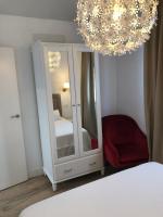 Postel nebo postele na pokoji v ubytování Apartamentos Tierra y Mar 1 -Arrecife