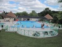 a group of people in a swimming pool at Gîte Valençay, 4 pièces, 6 personnes - FR-1-591-148 in Valençay