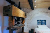 Posteľ alebo postele v izbe v ubytovaní Le Moulin de Boursac
