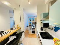 A kitchen or kitchenette at Peony Holló Apartment - Free Garage under the house