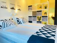 A bed or beds in a room at Peony Holló Apartment - Free Garage under the house