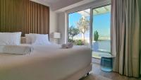 Posteľ alebo postele v izbe v ubytovaní One 360 Skyline Athens Penthouses