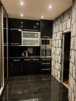 Kuchyň nebo kuchyňský kout v ubytování Apartment Lupáčova