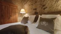 A bed or beds in a room at Podere Le Vedute