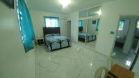 Postel nebo postele na pokoji v ubytování Apartamento amueblado en Santiago, Res Blue Amber, 2 habitaciones